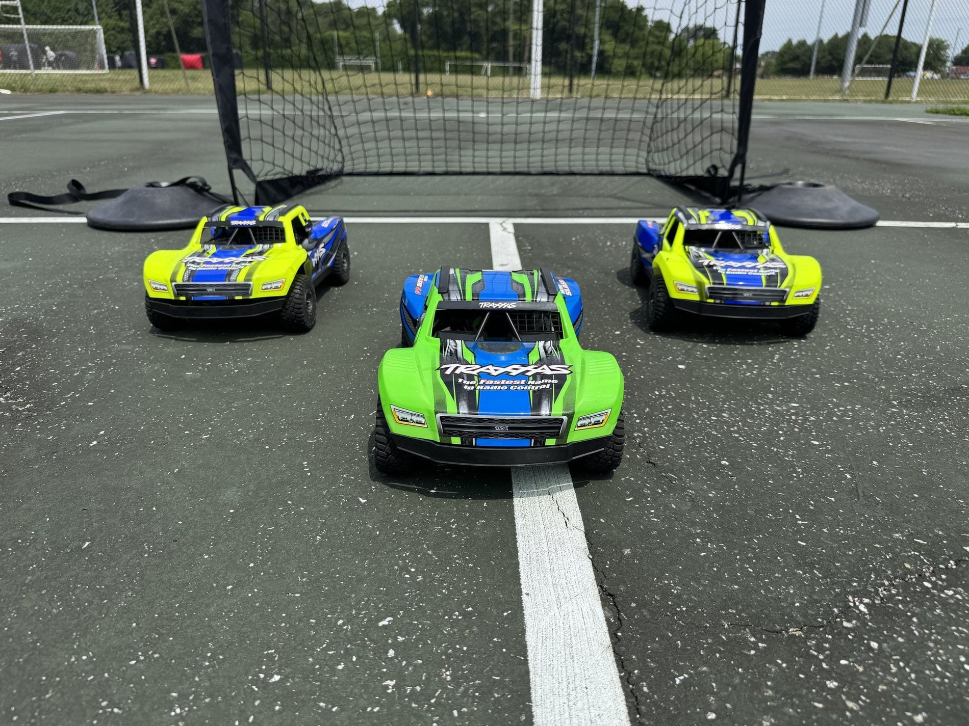 RC cars lined up on a Next Level Gaming inflatable course in the DMV