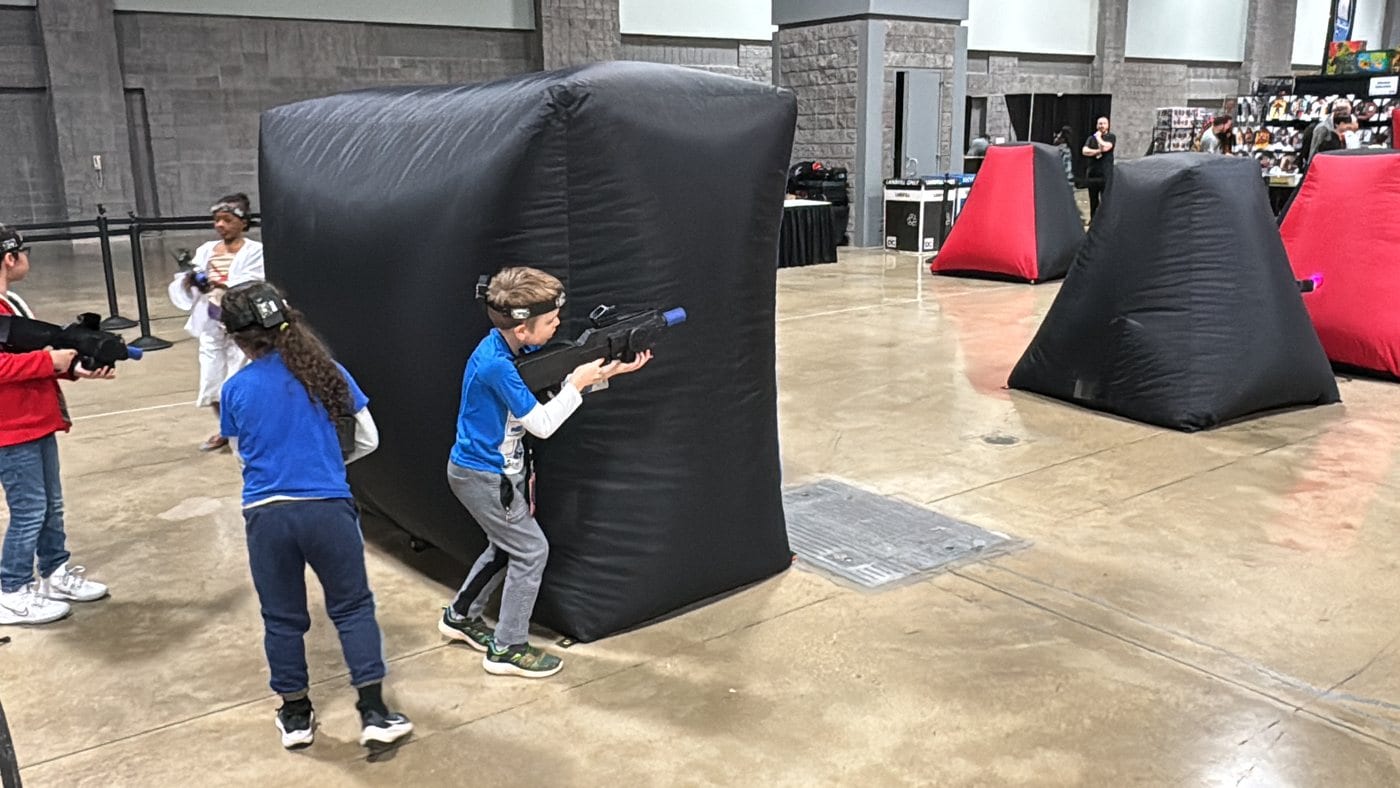 Players with laser taggers at a Next Level Gaming event in the DMV