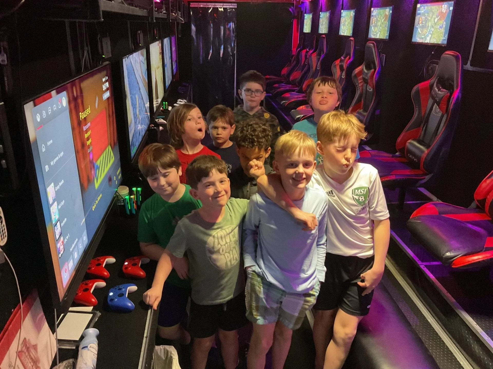 A real Next Level Gaming party playing together inside the theater