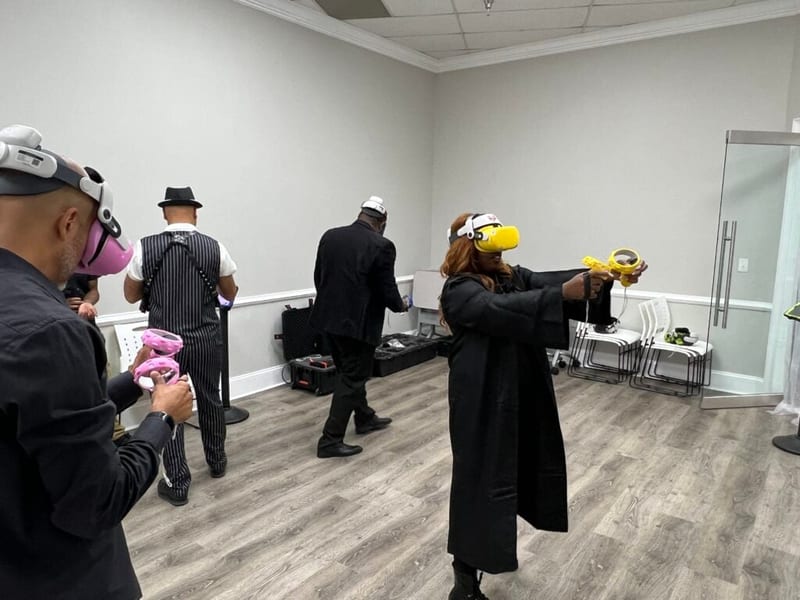 Young guests playing together in Meta Quest VR headsets